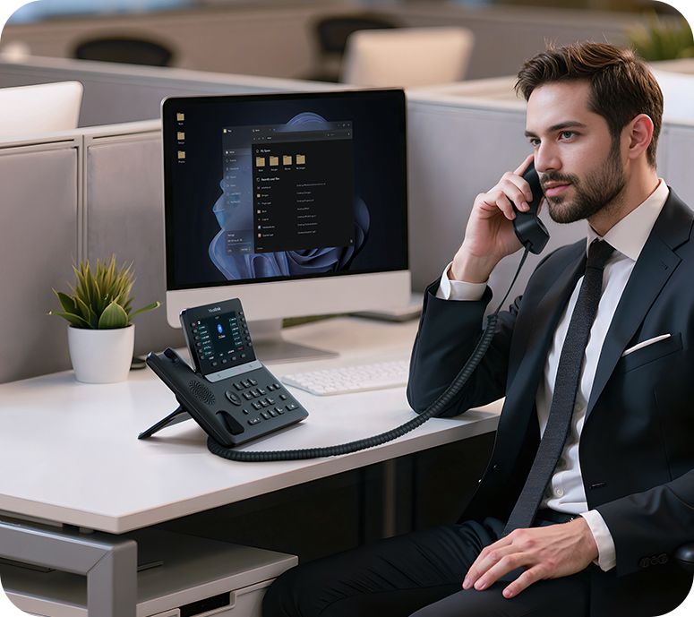 Yealink SIP-T85W on an executive desk